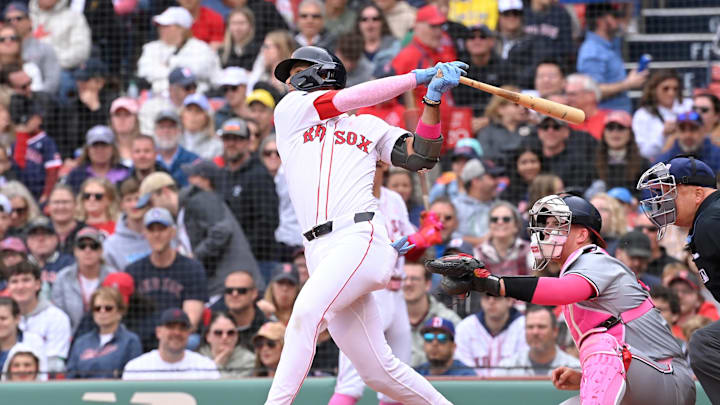 Boston Red Sox second baseman Vaughn Grissom (5) hits a single against the Washington Nationals during the sixth inning at Fenway Park in 2024. Boston Red Sox second baseman Vaughn Grissom (5) hits a single against the Washington Nationals during the sixth inning at Fenway Park in 2024.