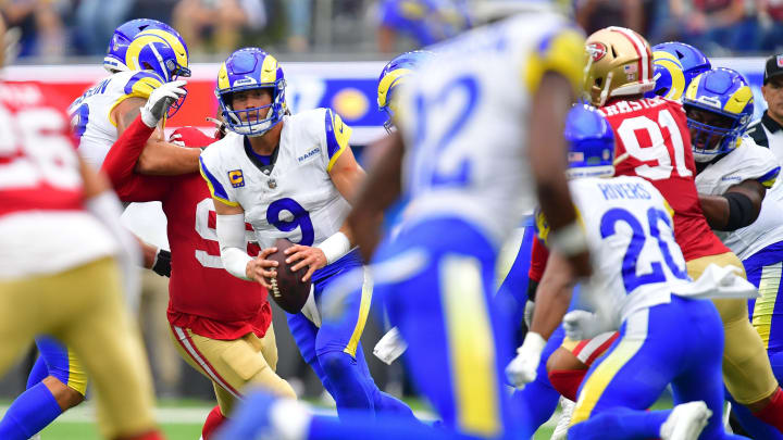 Sep 17, 2023; Inglewood, California, USA; Los Angeles Rams quarterback Matthew Stafford (9) runs the ball against the San Francisco 49ers during the second half at SoFi Stadium. Mandatory Credit: Gary A. Vasquez-USA TODAY Sports Sep 17, 2023; Inglewood, California, USA; Los Angeles Rams quarterback Matthew Stafford (9) runs the ball against the San Francisco 49ers during the second half at SoFi Stadium. Mandatory Credit: Gary A. Vasquez-USA TODAY Sports