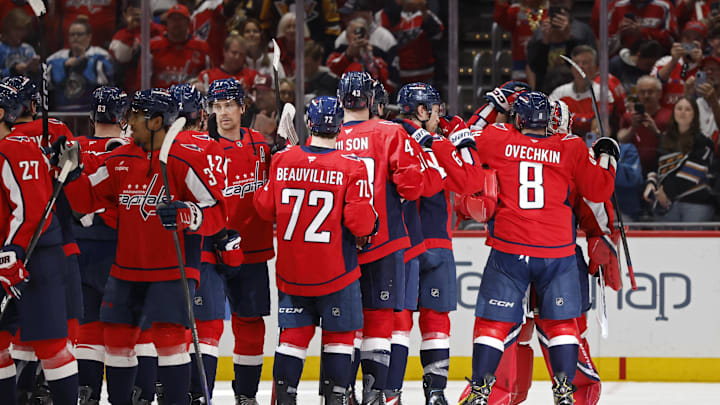Apr 12, 2026; Washington, District of Columbia, USA; Washington Capitals players celebrate after their game against the Pittsburgh Penguins at Capital One Arena. Mandatory Credit: Geoff Burke-Imagn Images