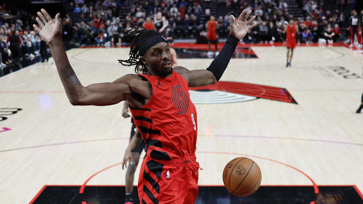 Feb 8, 2024; Portland, Oregon, USA; Portland Trail Blazers small forward Jerami Grant (9) dunks the ball during the first half against the Detroit Pistons at Moda Center. Mandatory Credit: Soobum Im-USA TODAY Sports