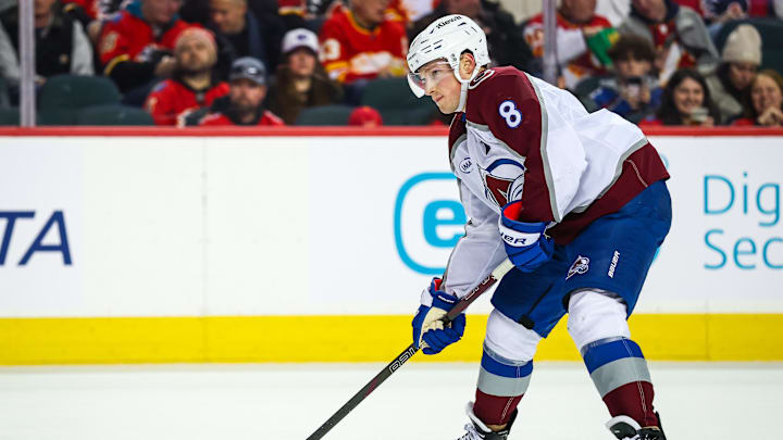 Feb 6, 2025; Calgary, Alberta, CAN; Colorado Avalanche defenseman Cale Makar (8) controls the puck against the Calgary Flames during the third period at Scotiabank Saddledome. Mandatory Credit: Sergei Belski-Imagn Images