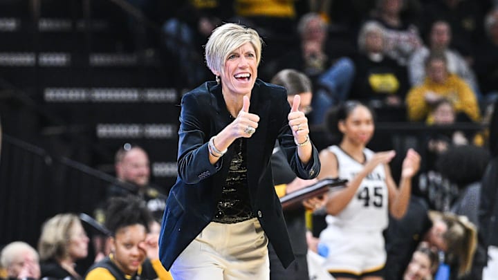 Dec 20, 2024; Iowa City, Iowa, USA; Iowa Hawkeyes head coach Jan Jensen reacts during the first quarter against the Northern Iowa Panthers at Carver-Hawkeye Arena. Mandatory Credit: Jeffrey Becker-Imagn Images Dec 20, 2024; Iowa City, Iowa, USA; Iowa Hawkeyes head coach Jan Jensen reacts during the first quarter against the Northern Iowa Panthers at Carver-Hawkeye Arena. Mandatory Credit: Jeffrey Becker-Imagn Images