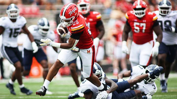 Aug 31, 2024; College Park, Maryland, USA; Maryland Terrapins running back Nolan Ray (25) breaks free from Connecticut Huskies defenders to score a touchdown during the first quarter at SECU Stadium. Mandatory Credit: Daniel Kucin Jr.-USA TODAY Sports Aug 31, 2024; College Park, Maryland, USA; Maryland Terrapins running back Nolan Ray (25) breaks free from Connecticut Huskies defenders to score a touchdown during the first quarter at SECU Stadium. Mandatory Credit: Daniel Kucin Jr.-USA TODAY Sports