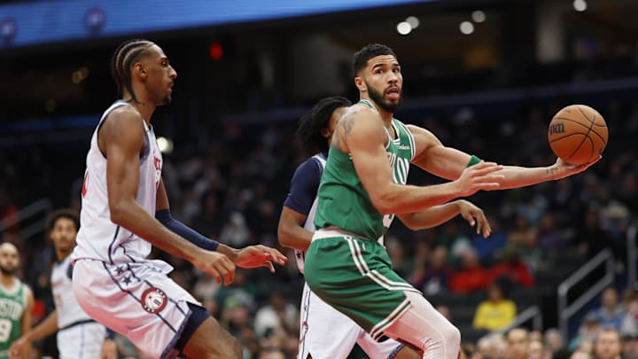 Dec 15, 2024; Washington, District of Columbia, USA;Boston Celtics forward Jayson Tatum (0) drives to the basket as Washington Wizards forward Alexandre Sarr (20) defends in the second quarter at Capital One Arena. Mandatory Credit: Geoff Burke-Imagn Images Dec 15, 2024; Washington, District of Columbia, USA;Boston Celtics forward Jayson Tatum (0) drives to the basket as Washington Wizards forward Alexandre Sarr (20) defends in the second quarter at Capital One Arena. Mandatory Credit: Geoff Burke-Imagn Images