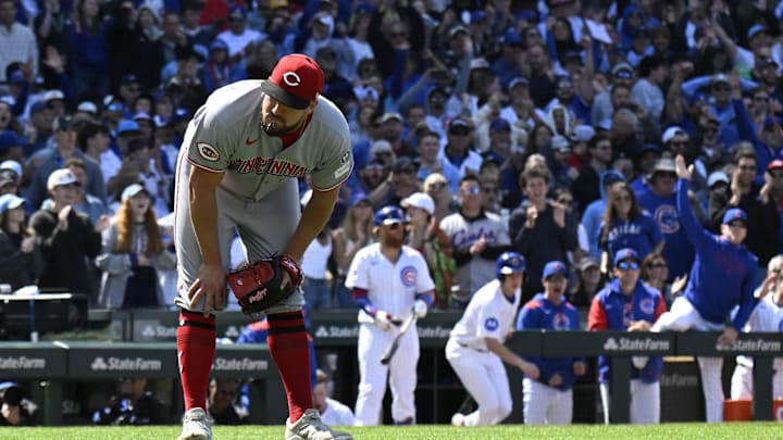 May 31, 2025; Chicago, Illinois, USA;  Cincinnati Reds pitcher Graham Ashcraft (23) reacts after the Chicago Cubs score during the eighth inning at Wrigley Field. Mandatory Credit: Matt Marton-Imagn Images