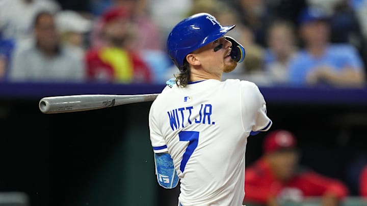 May 28, 2025; Kansas City, Missouri, USA; Kansas City Royals shortstop Bobby Witt Jr. (7) hits a sacrifice fly during the seventh inning against the Cincinnati Reds at Kauffman Stadium. Mandatory Credit: Jay Biggerstaff-Imagn Images