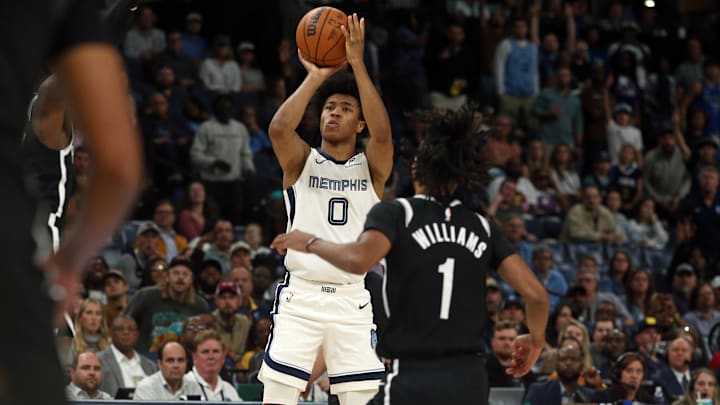 Oct 30, 2024; Memphis, Tennessee, USA; Memphis Grizzlies forward Jaylen Wells (0) shoots for three during the second half against the Brooklyn Nets at FedExForum. Mandatory Credit: Petre Thomas-Imagn Images