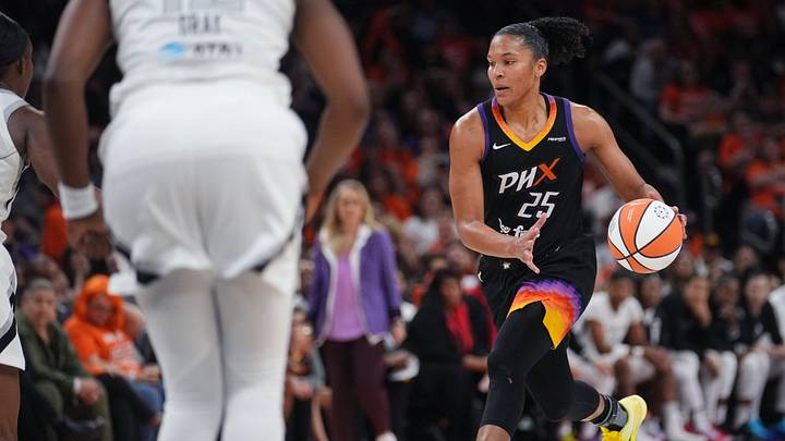 Phoenix Mercury forward Alyssa Thomas (25) brings the ball up court against Las Vegas Aces forward NaLyssa Smith (3) during Game 3 of the WNBA Finals at Mortgage Matchup Center in Phoenix on Oct. 8, 2025.
