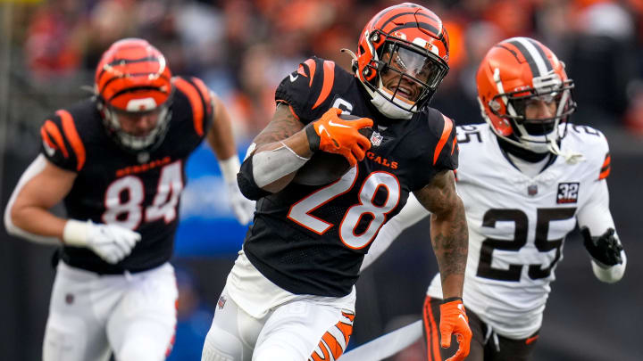 Cincinnati Bengals running back Joe Mixon (28) breaks away on a deep run in the first quarter of the NFL Week 18 game between the Cincinnati Bengals and the Cleveland Browns at Paycor Stadium in downtown Cincinnati on Sunday, Jan. 7, 2024.