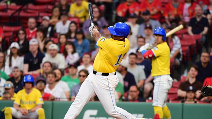 May 3, 2025; Boston, Massachusetts, USA; Boston Red Sox designated hitter Rafael Devers (11) hits an RBI single during the seventh inning against the Minnesota Twins at Fenway Park. Mandatory Credit: Bob DeChiara-Imagn Images May 3, 2025; Boston, Massachusetts, USA; Boston Red Sox designated hitter Rafael Devers (11) hits an RBI single during the seventh inning against the Minnesota Twins at Fenway Park. Mandatory Credit: Bob DeChiara-Imagn Images