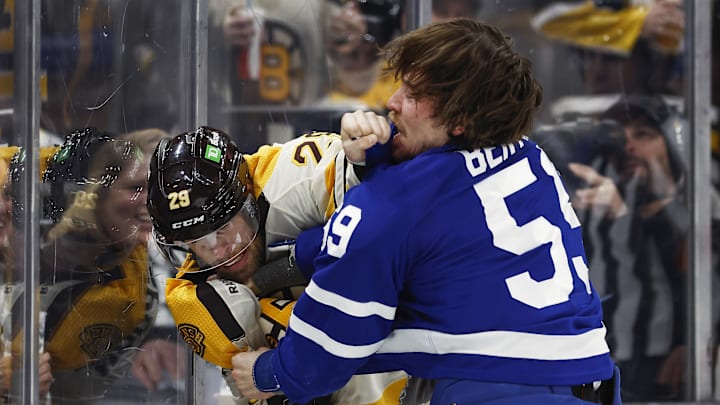 Mar 7, 2024; Boston, Massachusetts, USA; Toronto Maple Leafs left wing Tyler Bertuzzi (59) fights Bruins defenseman Parker Wotherspoon (29)