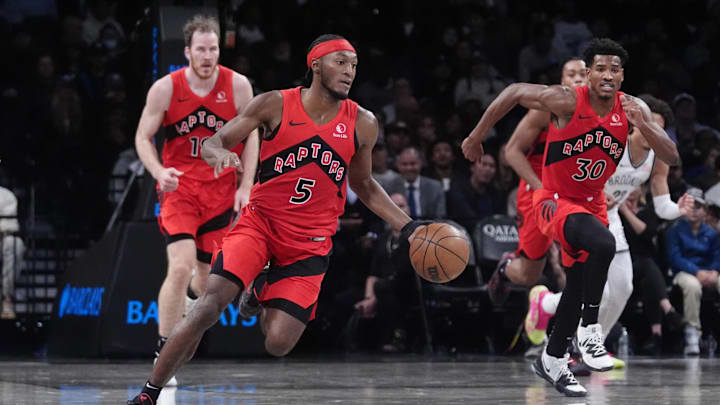 Oct 18, 2024; Brooklyn, New York, USA; Toronto Raptors shooting guard Immanuel Quickley (5) dribbles the ball against the Brooklyn Nets during the second half at Barclays Center. Mandatory Credit: Gregory Fisher-Imagn Images