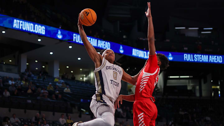 Dec 16, 2025; Atlanta, Georgia, USA; Georgia Tech Yellow Jackets guard Akai Fleming (0) dunks against the Marist Red Foxes in the second half at McCamish Pavilion. Mandatory Credit: Brett Davis-Imagn Images