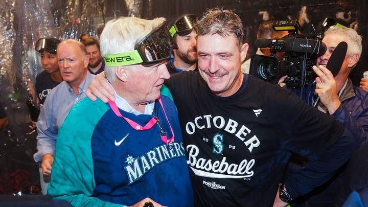Sep 23, 2025; Seattle, Washington, USA; Seattle Mariners manager Dan Wilson, right, celebrates with majority owner John Stanton following a playoff-clinching victory against the Colorado Rockies at T-Mobile Park. Mandatory Credit: Joe Nicholson-Imagn Images Sep 23, 2025; Seattle, Washington, USA; Seattle Mariners manager Dan Wilson, right, celebrates with majority owner John Stanton following a playoff-clinching victory against the Colorado Rockies at T-Mobile Park. Mandatory Credit: Joe Nicholson-Imagn Images