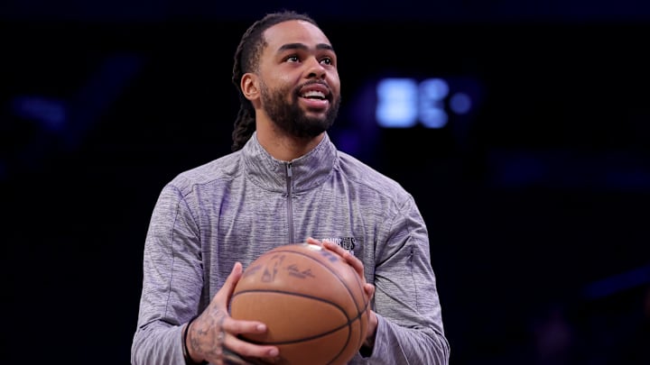 Mar 10, 2025; Brooklyn, New York, USA; Brooklyn Nets guard D'Angelo Russell (1) warms up before a game against the Los Angeles Lakers at Barclays Center. Mandatory Credit: Brad Penner-Imagn Images