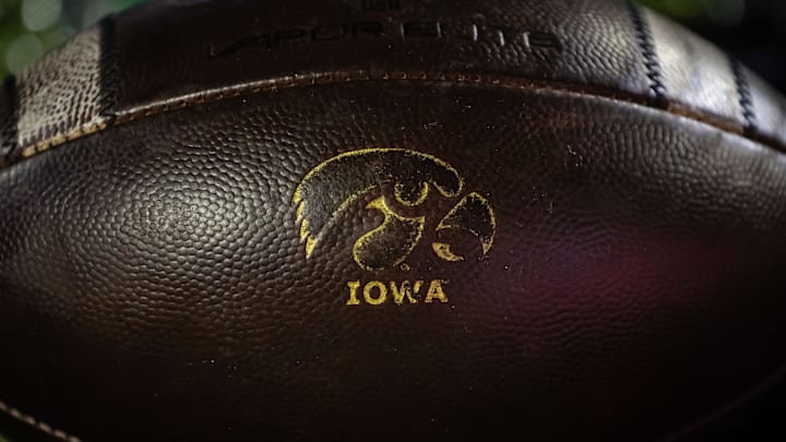 Oct 1, 2021; College Park, Maryland, USA; A detailed view of an Iowa Hawkeyes logo on a football during the second half of the game between the Maryland Terrapins and the Iowa Hawkeyes at Capital One Field at Maryland Stadium. Mandatory Credit: Scott Taetsch-Imagn Images