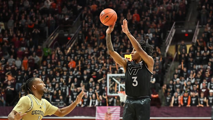 Jan 27, 2026; Blacksburg, Virginia, USA;  Virginia Tech Hokies guard Ben Hammond (3) shoots a shot as Georgia Tech Yellow Jackets guard Lamar Washington (1) defends during the second half  at Cassell Coliseum. Mandatory Credit: Brian Bishop-Imagn Images