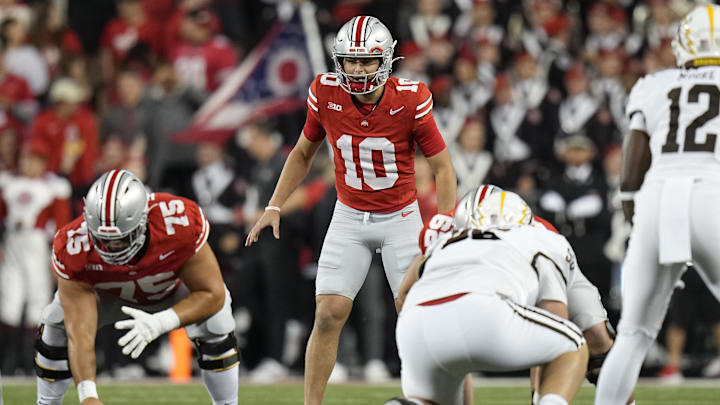 Sep 7, 2024; Columbus, Ohio, USA; Ohio State Buckeyes quarterback Julian Sayin (10) takes a snap against the Western Michigan Broncos during the second half at Ohio Stadium. Mandatory Credit: Adam Cairns-Imagn Images Sep 7, 2024; Columbus, Ohio, USA; Ohio State Buckeyes quarterback Julian Sayin (10) takes a snap against the Western Michigan Broncos during the second half at Ohio Stadium. Mandatory Credit: Adam Cairns-Imagn Images