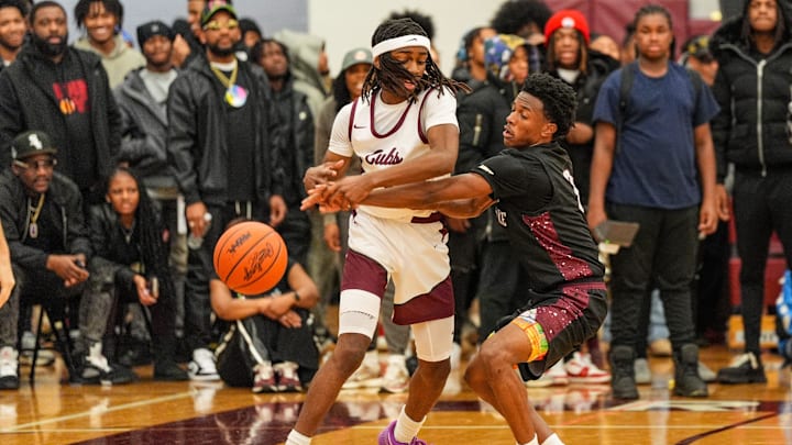 Renaissance guard Jordan Sigmon knocks the ball loose while defending U of D Jesuit guard Leroy Blyden during the second half of the 2025 MHSAA boys basketball finals at Detroit Renaissance High School, Friday, Feb. 28, 2025. Renaissance guard Jordan Sigmon knocks the ball loose while defending U of D Jesuit guard Leroy Blyden during the second half of the 2025 MHSAA boys basketball finals at Detroit Renaissance High School, Friday, Feb. 28, 2025.