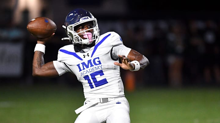 IMG Academy wide receiver Eric McFarland (#16) passes the ball to a wide open Adonis Moise, for an 80-yard touchdown on IMG's first play of the game. The Venice High School Indians hosted the IMG Academy Ascenders National team on Friday, Oct. 4, 2024.