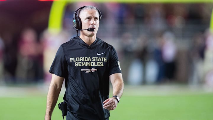 Florida State Seminoles head coach Mike Norvell walks down the field. The Miami Hurricanes lead the Florida State Seminoles 14-3 at the half on Saturday, Oct. 4, 2025.