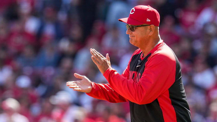Cincinnati Reds manager Terry Francona (77) relives pitcher Brock Burke (49) in the seventh inning of the MLB Interleague game between the Cincinnati Reds and the Boston Red Sox at Great American Ball Park in downtown Cincinnati on Sunday, March 29, 2026. The game was scoreless after three innings. The Reds won 3-2 to take the season-opening series from the Red Sox. Cincinnati Reds manager Terry Francona (77) relives pitcher Brock Burke (49) in the seventh inning of the MLB Interleague game between the Cincinnati Reds and the Boston Red Sox at Great American Ball Park in downtown Cincinnati on Sunday, March 29, 2026. The game was scoreless after three innings. The Reds won 3-2 to take the season-opening series from the Red Sox.