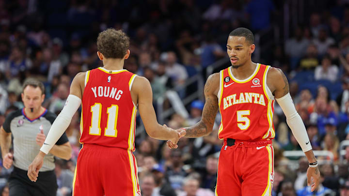 Nov 30, 2022; Orlando, Florida, USA;  Atlanta Hawks guard Dejounte Murray (5) and guard Trae Young