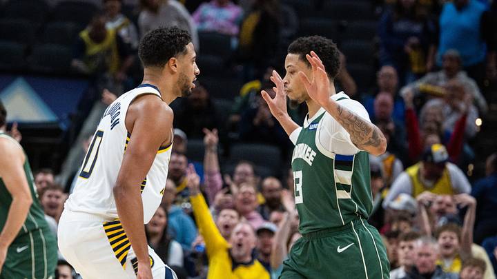 Oct 16, 2026; Indianapolis, Indiana, USA; Indiana Pacers guard Tyrese Haliburton (0) and Milwaukee Bucks guard Ryan Rollins (13) defend during the first half at Gainbridge Fieldhouse. Mandatory Credit: Trevor Ruszkowski-Imagn Images Oct 16, 2026; Indianapolis, Indiana, USA; Indiana Pacers guard Tyrese Haliburton (0) and Milwaukee Bucks guard Ryan Rollins (13) defend during the first half at Gainbridge Fieldhouse. Mandatory Credit: Trevor Ruszkowski-Imagn Images