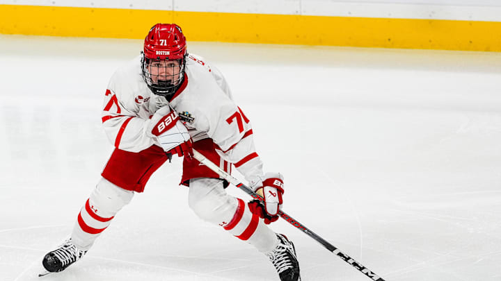 Apr 11, 2024; Saint Paul, Minnesota, USA; Boston U. forward Macklin Celebrini (71) carries the puck in the semifinals of the 2024 Frozen Four college ice hockey tournament during the third period against Denver at Xcel Energy Center. Mandatory Credit: Brace Hemmelgarn-USA TODAY Sports