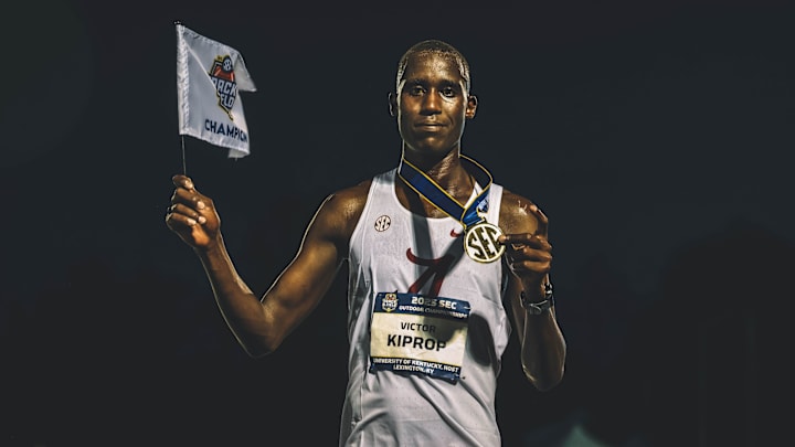 Victor Kiprop with SEC championship medal in the 10,000m race