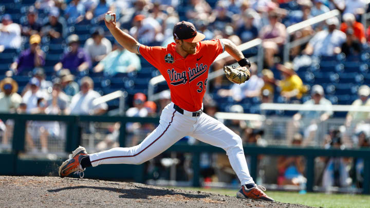 Chase Hungate delivers a pitch during the Virginia baseball game against North Carolina at the College World Series in Omaha.