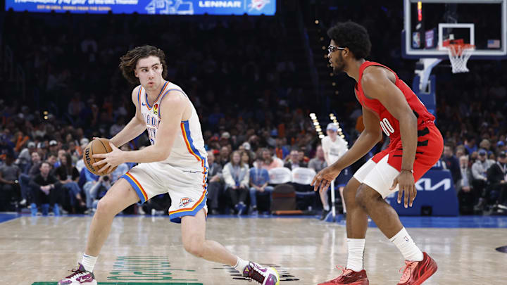 Jan 11, 2024; Oklahoma City, Oklahoma, USA; Oklahoma City Thunder guard Josh Giddey (3) is defended