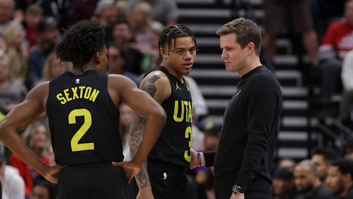 Feb 14, 2024; Salt Lake City, Utah, USA;  Utah Jazz head coach Will Hardy talks to guard Keyonte George (3) and guard Collin Sexton (2) during the first quarter at Delta Center. Mandatory Credit: Chris Nicoll-Imagn Images