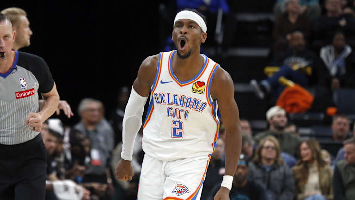 Nov 9, 2025; Memphis, Tennessee, USA; Oklahoma City Thunder guard Shai Gilgeous-Alexander (2) reacts after a three point basket during the fourth quarter against the Memphis Grizzlies at FedExForum. Mandatory Credit: Petre Thomas-Imagn Images
