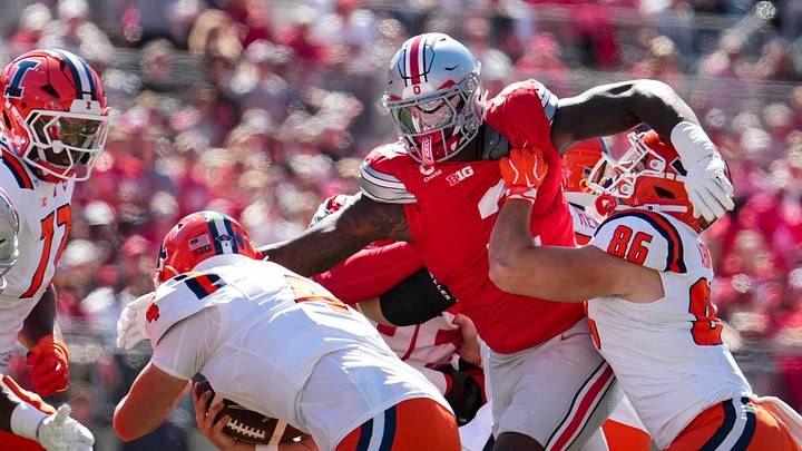 Ohio State Buckeyes defensive end Kenyatta Jackson Jr. (2) sacks Illinois Fighting Illini quarterback Katin Houser (4) during the NCAA football game at Ohio Stadium in Columbus on Sept. 26, 2026.