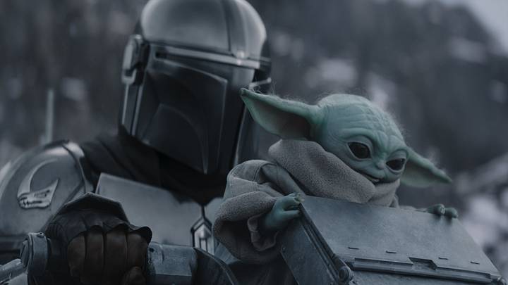 (L-R) The Mandalorian and Grogu in Lucasfilm's THE MANDALORIAN AND GROGU. Photo courtesy of Lucasfilm. © 2026 Lucasfilm Ltd™. All Rights Reserved.