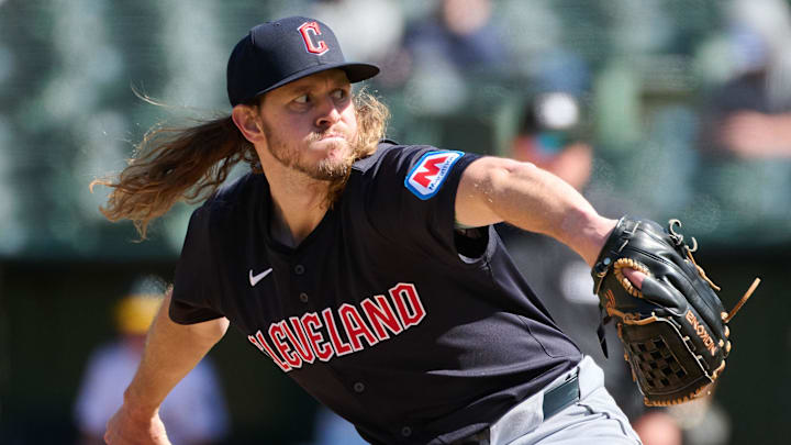Mar 31, 2024; Oakland, California, USA; Cleveland Guardians pitcher Scott Barlow (58) throws a pitch against the Oakland A's