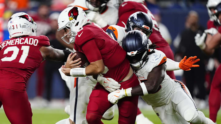 Aug 16, 2025; Denver, Colorado, USA; Denver Broncos linebacker Jordan Turner (55) sacks Arizona Cardinals quarterback Clayton Tune (15) in the second half at Empower Field at Mile High. Mandatory Credit: Ron Chenoy-Imagn Images Aug 16, 2025; Denver, Colorado, USA; Denver Broncos linebacker Jordan Turner (55) sacks Arizona Cardinals quarterback Clayton Tune (15) in the second half at Empower Field at Mile High. Mandatory Credit: Ron Chenoy-Imagn Images
