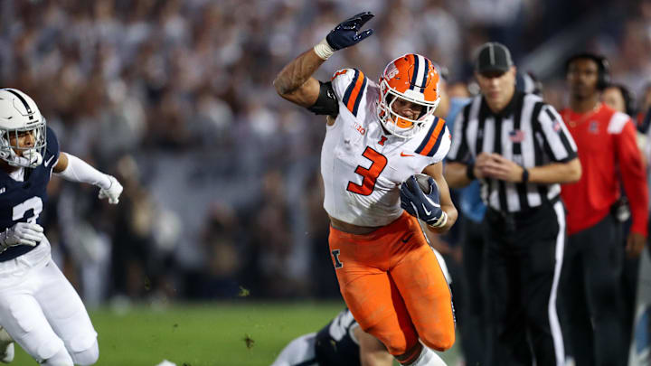 Sep 28, 2024; University Park, Pennsylvania, USA; Illinois Fighting Illini running back Kaden Feagin (3) runs during the first quarter against the Penn State Nittany Lions at Beaver Stadium. Mandatory Credit: Matthew O'Haren-Imagn Images