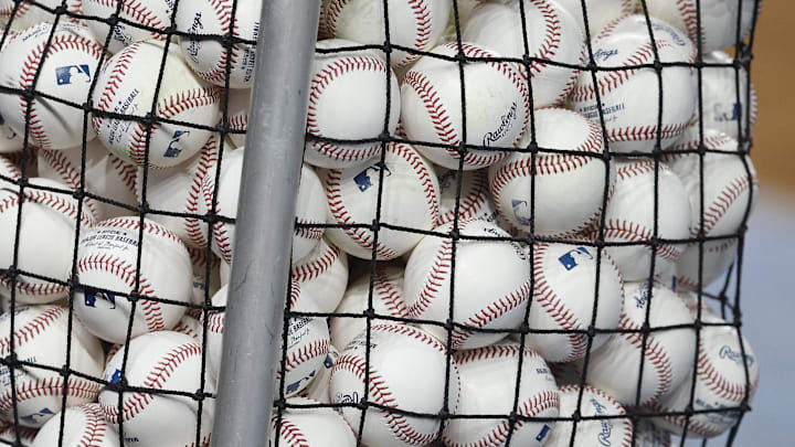 Jun 2, 2025; Miami, Florida, USA; A bucket of baseball sits on the field before the game between the Colorado Rockies and the Miami Marlins before the game at loanDepot Park. Mandatory Credit: Rhona Wise-Imagn Images Jun 2, 2025; Miami, Florida, USA; A bucket of baseball sits on the field before the game between the Colorado Rockies and the Miami Marlins before the game at loanDepot Park. Mandatory Credit: Rhona Wise-Imagn Images