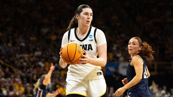 Iowa center Ava Heiden (5) grabs the basketball March 21, 2026 during a First Round NCAA March Madness game against the Fairleigh Dickinson Knights at Carver-Hawkeye Arena in Iowa City, Iowa.