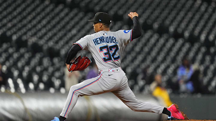 Sep 16, 2025; Denver, Colorado, USA; Miami Marlins pitcher Ronny Henriquez (32) delivers a pitch in the ninth inning against the Colorado Rockies at Coors Field. 