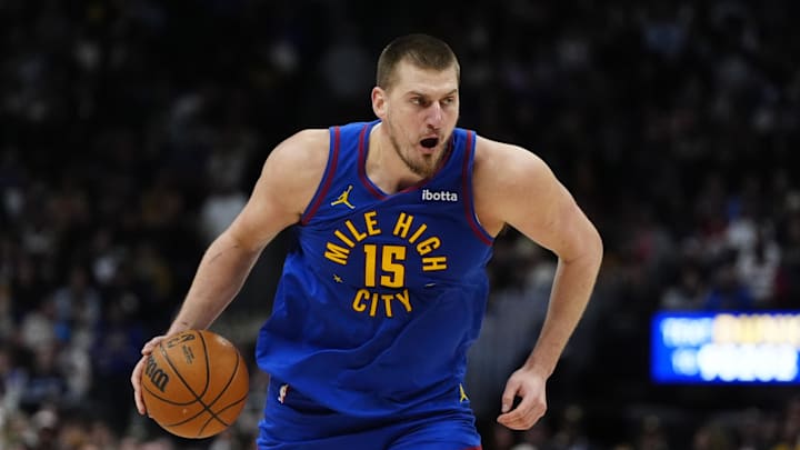 Feb 3, 2025; Denver, Colorado, USA; Denver Nuggets center Nikola Jokic (15) controls the ball in the second half against the New Orleans Pelicans at Ball Arena. Mandatory Credit: Ron Chenoy-Imagn Images