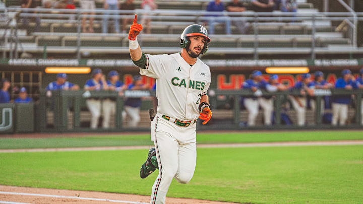 Miami right fielder Derek Williams Against Florida Gulf Coast and hitting a home run.
