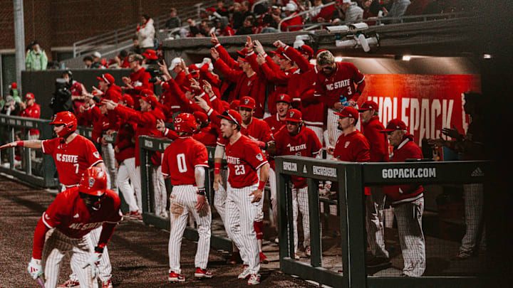 The NC State dugout celebrates during the team's 13-6 victory over the Miami Hurricanes in the second game of a doubleheader on Friday, May 1, 2026 in Raleigh, N.C. The NC State dugout celebrates during the team's 13-6 victory over the Miami Hurricanes in the second game of a doubleheader on Friday, May 1, 2026 in Raleigh, N.C.