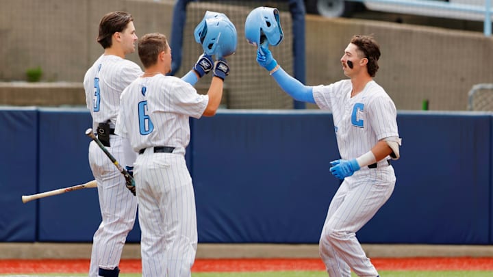 Columbia baseball players celebrate.