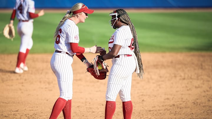 Alabama softball players Ambrey Taylor and Vic Moten in the SEC Tournament Championship game Alabama softball players Ambrey Taylor and Vic Moten in the SEC Tournament Championship game
