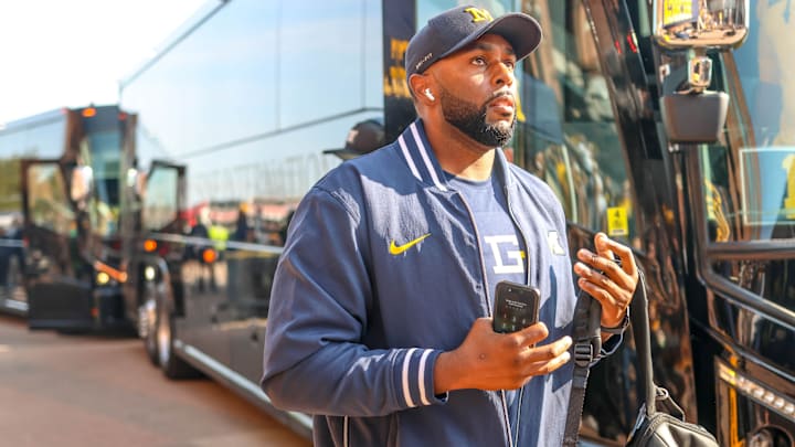 Michigan football head coach Sherrone Moore, players honor the memory of athletic counselor Greg Harden with t-shirts, hats and helmet decals for Saturday's game vs. Arkansas State. Michigan football head coach Sherrone Moore, players honor the memory of athletic counselor Greg Harden with t-shirts, hats and helmet decals for Saturday's game vs. Arkansas State.