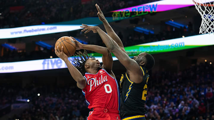 Draymond Green defends the basket.