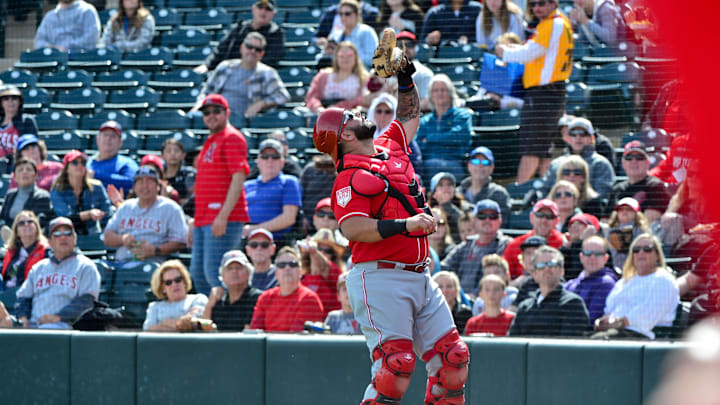 Cincinnati Reds catcher Chris Okey (68) catches a foul ball.